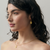 13th wedding anniversary Citrine and Gold Artisan pendant on gold necklace as worn  | Lily Gardner London