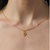 February amethyst and gold pendant necklace artisan look as worn | Lily Gardner London						

