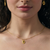 garnet and gold pendant necklace with artisan look as worn | Lily Gardner London				
