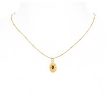 January birthstone garnet and gold artisan pendant necklace | Lily Gardner London		