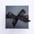 Black gift box with Lily Gardner London logo-ed ribbon 