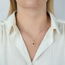 55th Wedding Anniversary Emerald Crystal Pendant with Gold Chain As Worn | Lily Gardner London